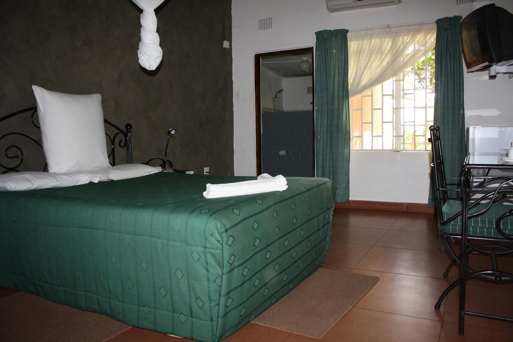 Palmwood Lodge Lusaka Habitación foto